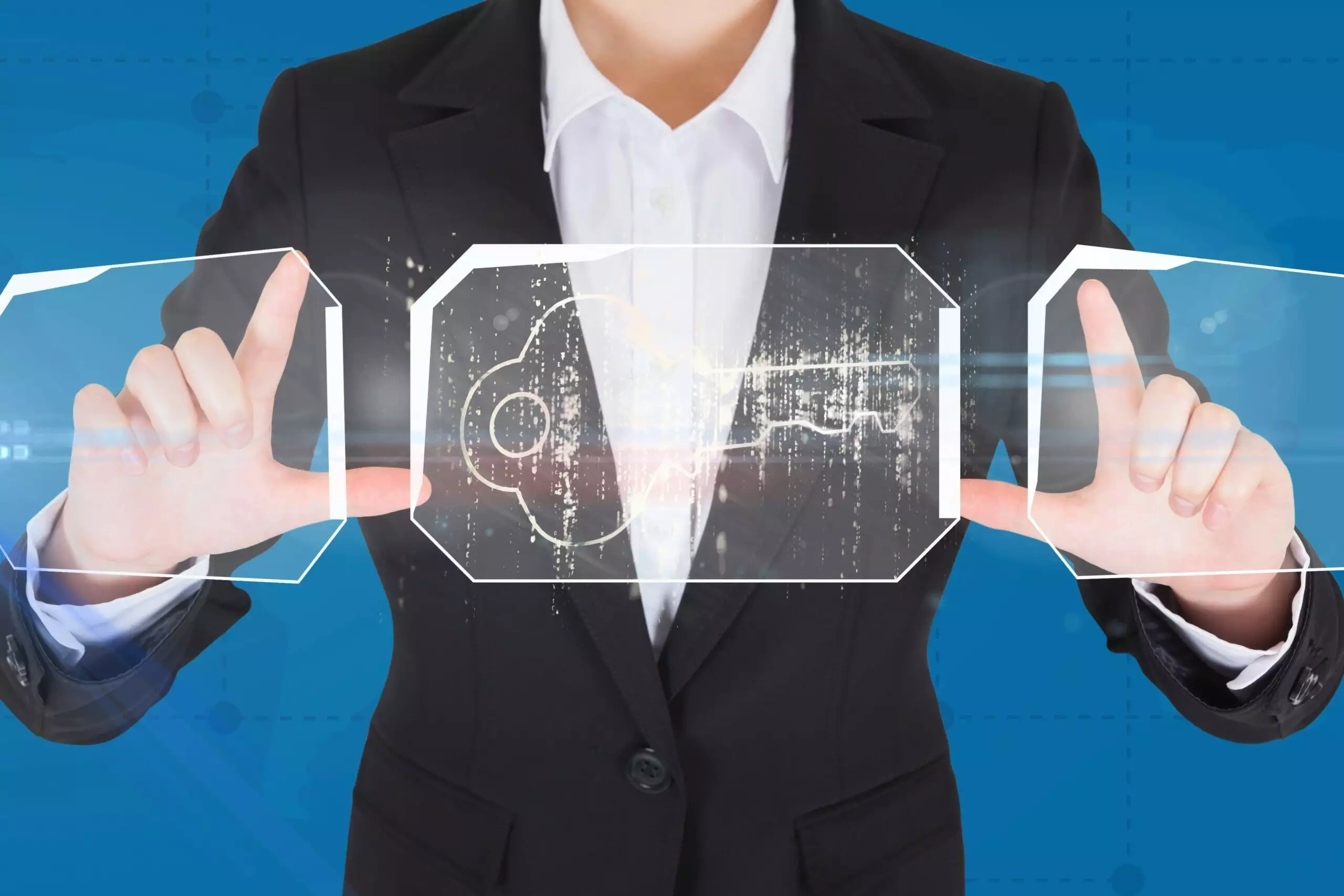 Businessperson interacting with futuristic transparent screen displaying digital text