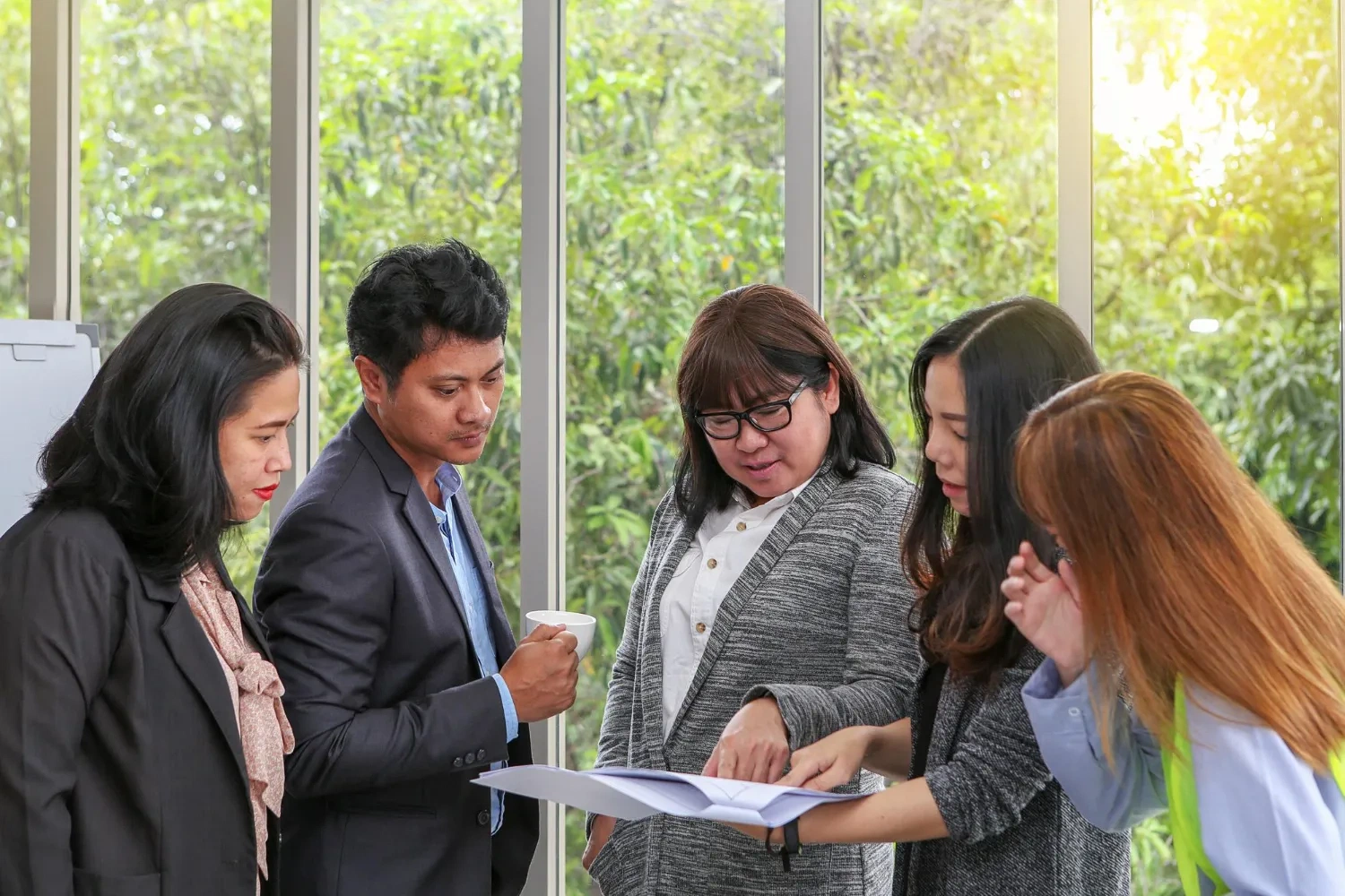 Team reviewing documents for incorporated associations, discussing member disputes.